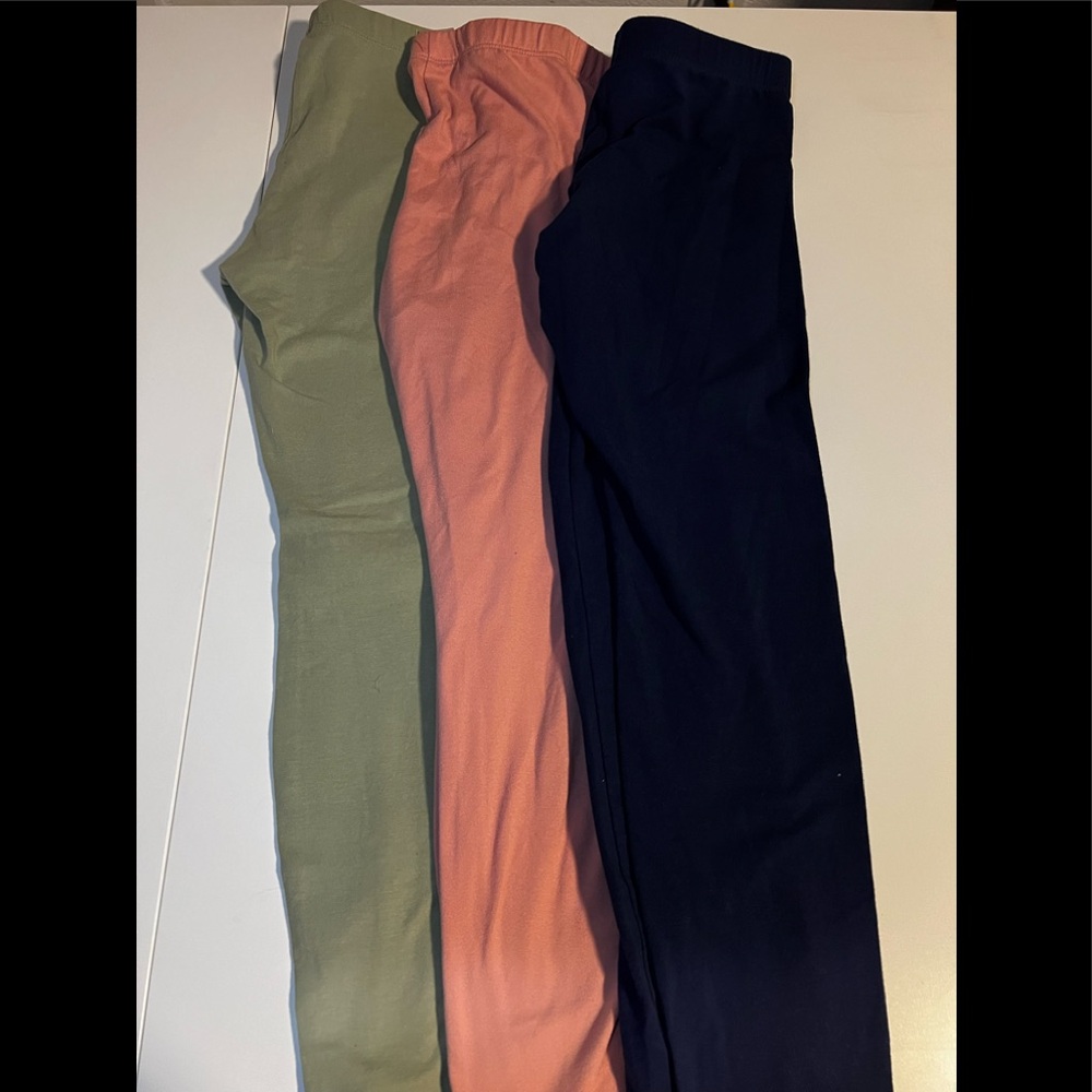 Girls leggings navy blue, pink, green. Comes with all 3 girls size large 10/12